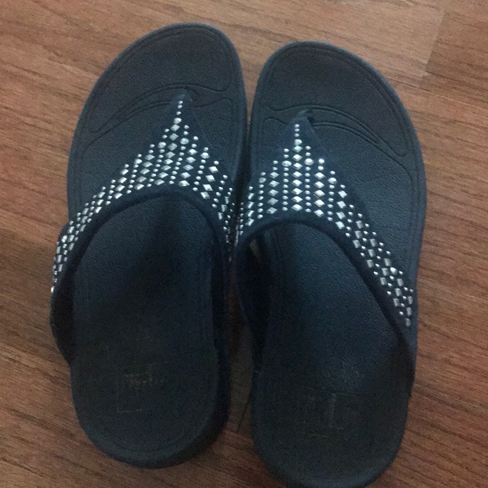 Navy blue FitFlop sandals with silver studs